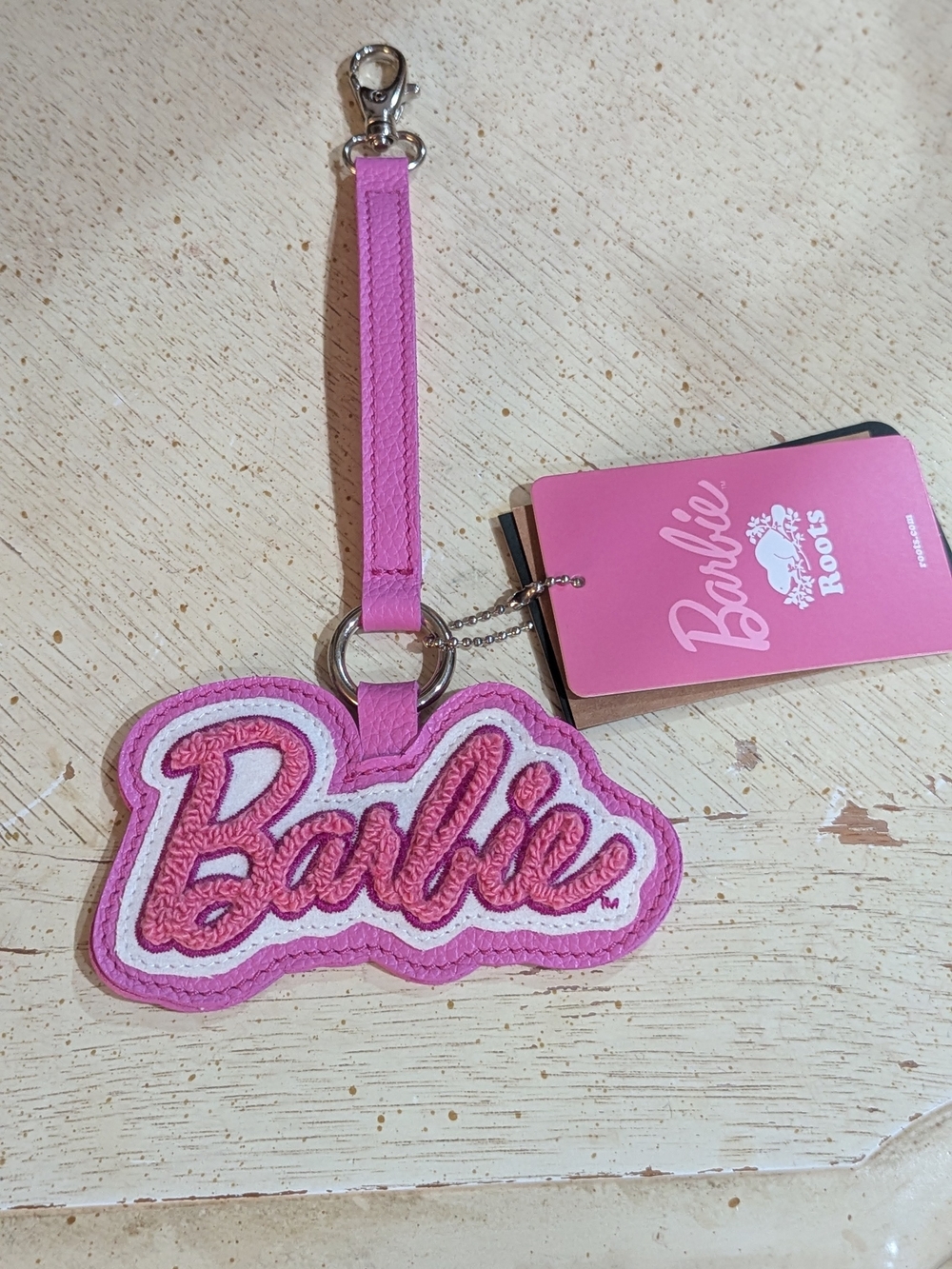 Roots Barbie Pink Logo Keychain Wristlet